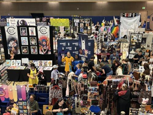 Sarah and Allie in a sea of vendors at at Fort Collins Comic Con 2024