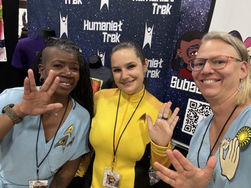 Sarah and Allie with a convention guest