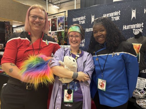 Sarah and Allie in Lower Decks uniforms with Kestrel of Siren Sundries (and friend of the show).